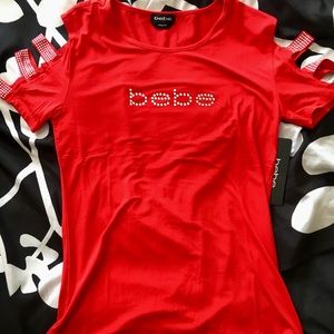 NWT Bebe designer Top